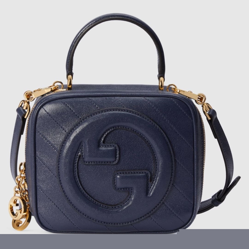 G*u*i top handle bags